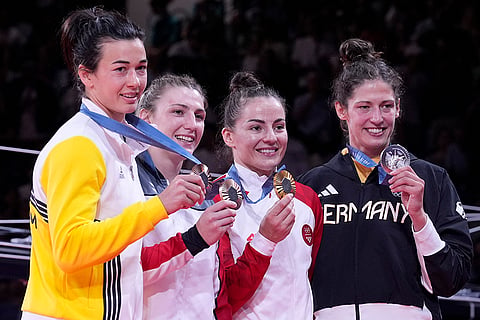 Medal ceremony for women's -70kg event in the team judo competition